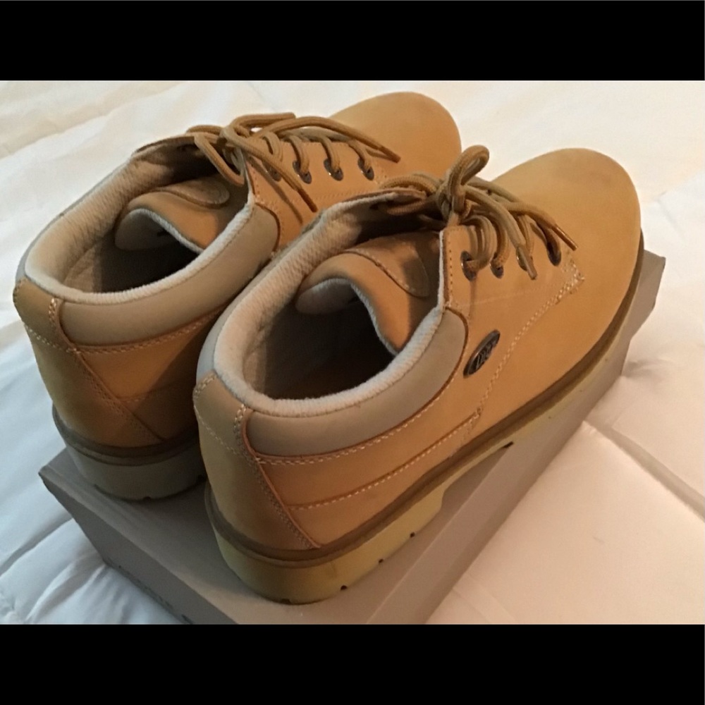 Men shoes by NY Lugz company. See pic 4 for flaw. A little rubbing on the side.